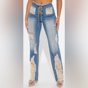 Taking A Risk Tinted Ripped Lace Up Bootcut Jeans - Vintage Wash